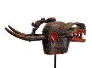 wooden sculpture of an animal skull